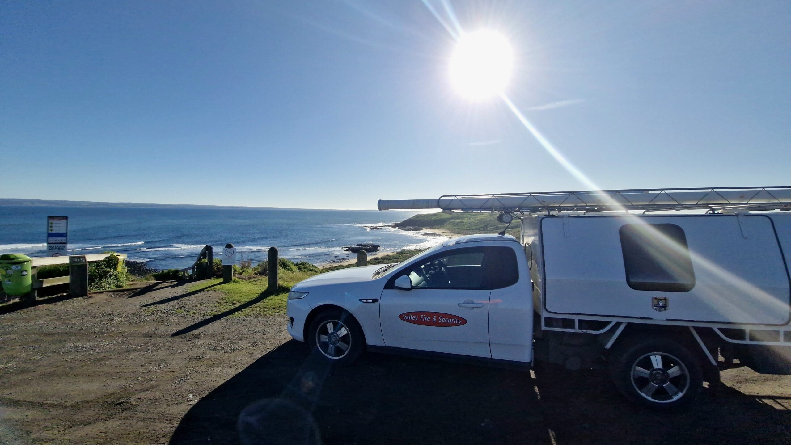 Ford Falcon FG Work car parked beside coast line