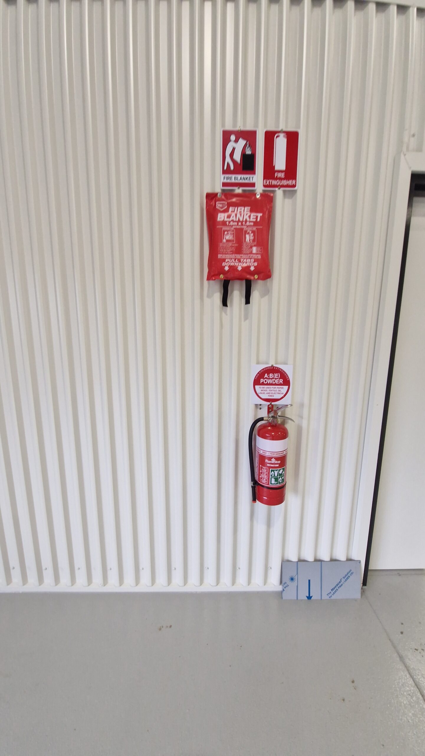 Extinguisher and Fire Blanket on wall